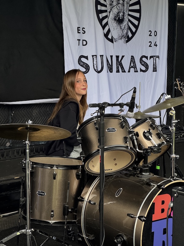 Harper on the drums